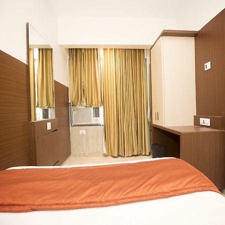 Hotel Spring Inn Мумбаи Экстерьер фото